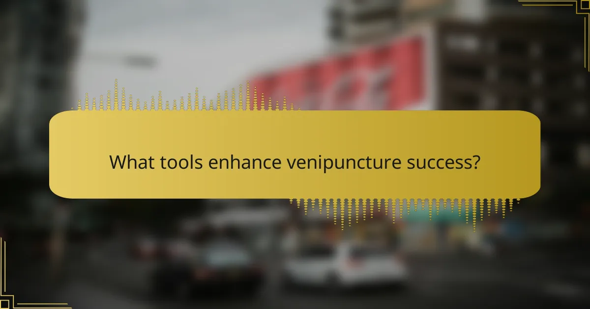 What tools enhance venipuncture success?